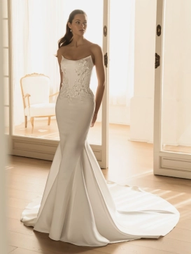 ÉLYSÉE Bridal HAVARA luxury crepe mermaid wedding dress featuring a modern square neckline, floral lace appliqué bodice, sculpted silhouette and sweeping cathedral train.
