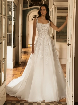 ÉLYSÉE Bridal HELEN luxury floral lace A-line wedding dress featuring a square neckline, illusion corset bodice, delicate shoulder straps and a cathedral-length tulle train.