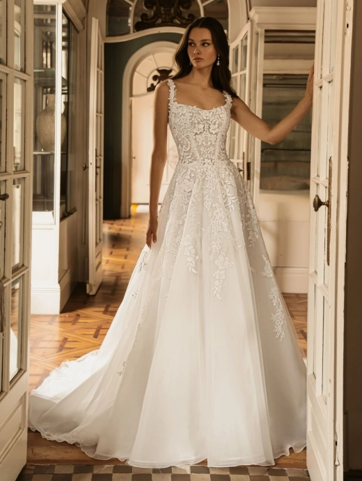 ÉLYSÉE Bridal HELEN luxury floral lace A-line wedding dress featuring a square neckline, illusion corset bodice, delicate shoulder straps and a cathedral-length tulle train.